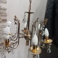 لوستر برنجی با لامپ