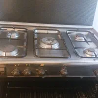 اجاق گاز پنج شعله مارک تکنو گاز با فر در حد نو