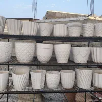 حراج گلدان .شیشه بامبو. خاک