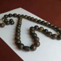 تسبیح دست‌ساز کلکسیونی هسته خرمای وحشی و مس