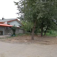 خانه ویلایی با مغازه و زمین سند دار بر خیابان اصلی
