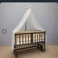 تخت کنار مادر گهواره ای