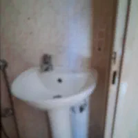 روشویی و آینه و شیر آلات دستشویی