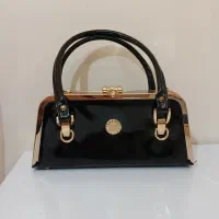 کیف مجلسی ورنی مشکی با یراق طلایی