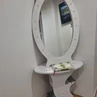 یه عدد اینه شمعدان سفید و یه عدد ساعت ایستاده سالم