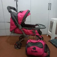 کالسکه و ساک لباس بچه