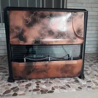 بخاری گازی طرح شومینه ۱۴۰۰۰ کاملا در حد نو