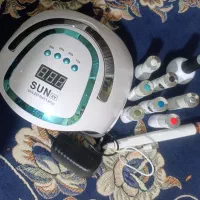 دستگاه کاشت ناخن