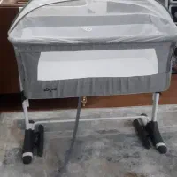 گهواره کنار تخت مادر و قنداق سوئیسی