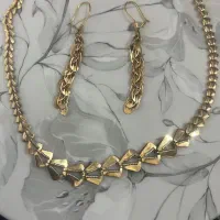 سرویس طلا و ربع سکه و چند سوت