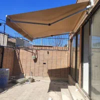 سایبان درب برقی جک بازویی قسطی|خدمات پیشه و مهارت|بم, |دیوار