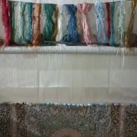 به یک خانم که قالی بافی بلد باشد نیازمندیم