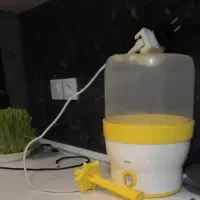 استریل کننده شیشه شیر