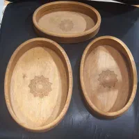 سه ظرف چوبی بیضی شکل