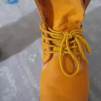 بوت ساق بلند|کیف، کفش، کمربند|بندر انزلی, زنبق|دیوار