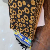 ۳ عدد شومیز و بلوز ۴عدد مانتو و پالتو و ۷ شال