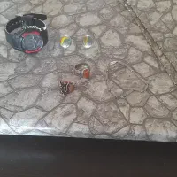 ساعت و گردنبند