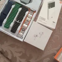 ایرپاد. پاور . ساعت .شارژر و ۷عدد بند رنگی و فلزی