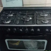 چند تیکه وسایل خانه فرناز گاز ۲عددبخاری وفرش ۱۲و۶