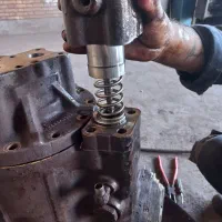 مکانیک سنگین جرثقیل .لودر بیل میکانیکی بلدوزر