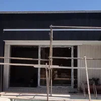 استاد کار نما ساختمان (آجر) و یک نفر وردست ماهر