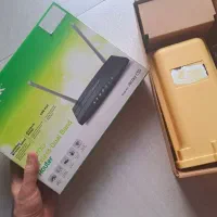 مودم زیتل و روتر TP-LINK مدل Archer C50 با هم