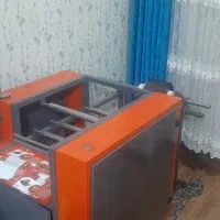 یک دستگاه بسته بندی سفره یکبارمصرف و کیسه زباله نو