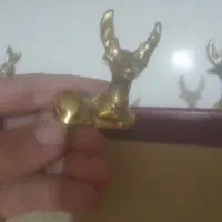 گوزن برنجی دکری|کلکسیون اشیاء عتیقه|نیشابور, خط کاشمر|دیوار