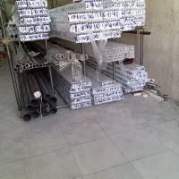 کرکره برقی و جک پارکینگی سایبان برقی درب آکاردئونی