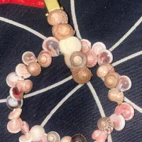 دستبند صدف و گل سر از کیش