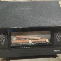بخاری گازی طرح شومینه