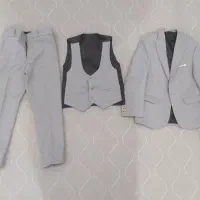 یک دست کت و شلوار بچه گانه