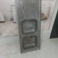 یک عدد روشویی و سینک دو قولو