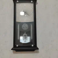 ساعت دیواری عقبدار