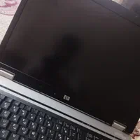 لپ تاپ کارکرده با ویندوز 11 و آداپتور