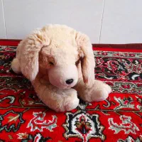 عروسک توله سگ سفید به همراه یک عدد خرسی اشانتیون