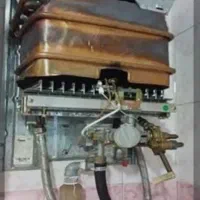 تعمیر آبگرمکن پمپ آب. آب تصفیه کن شیر آلات