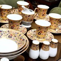 سرویس چینی 12 نفره کمیاب طلایی 130پارچه 24 عیار