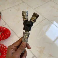 شلنگ پمپ باد و دستگاه دکمه زن