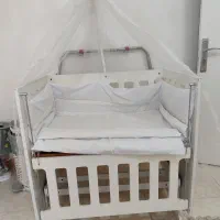 گهواره کنار تخت مادر|تخت و صندلی بچه|رشت, آب آسیاب|دیوار