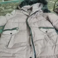 کاپشن  صورتی رنگ  با  خز  مشکی شیک