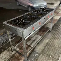 اجاق 4 شعله صنعتی خطی پایه دار مشابه نو|فروشگاه و مغازه|تهران, شهرک استقلال|دیوار