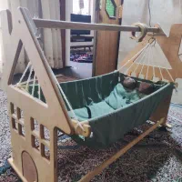 گهواره کلبه چوبی ه