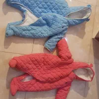 تعدادی لباس بچه و اغوشی و کاپشن و لباس بافت
