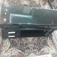 زیر تلویزیونی شیشه ای فروشی