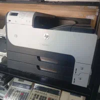 دستگاه پرینتر A3  HP laserjet m712 زن