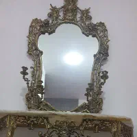 اینه .شمعدان