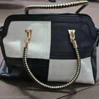 کیف مجلسی|کیف، کفش، کمربند|قم, انسجام|دیوار