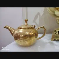 قوری برنزی گرد با طراحی شیک