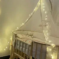 تخت نوزادی کنار مادر